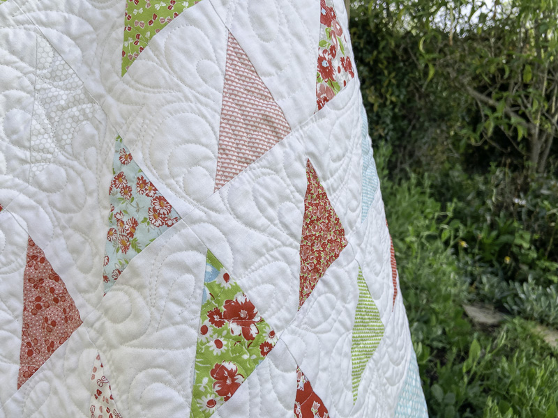 Patchwork Gifts Book Tour: A Scrappy Triangle Baby Quilt